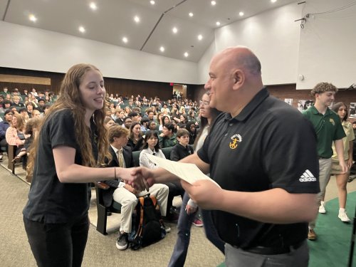 Academic Achievement Certificates Distributed at Student Town Hall